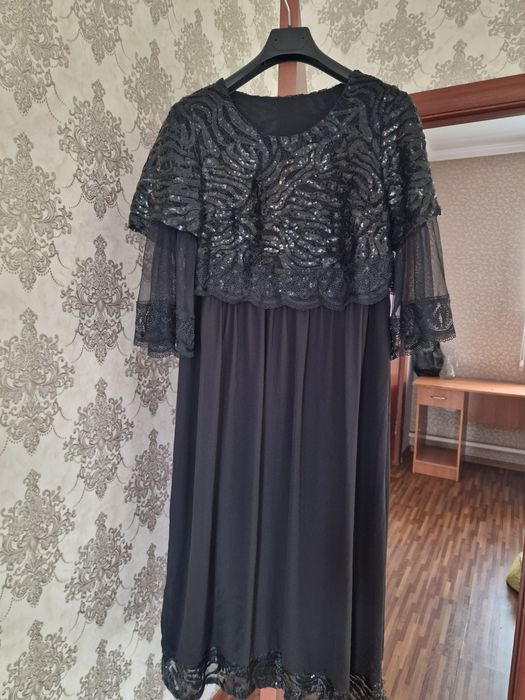 Элегантное черное платье.