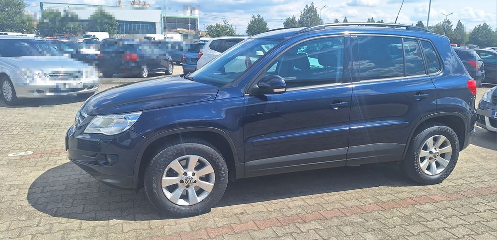 VW Tiguan  an 2011 motor 2.0i benzină 211 CP Full options 125.000 km 100% REALI Înmatriculat România taxe la zi distribuția schimbată etc;