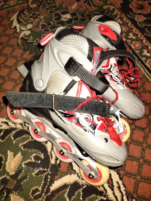 Роликовые коньки