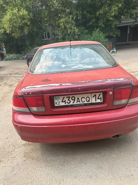 Мазда кронос      .