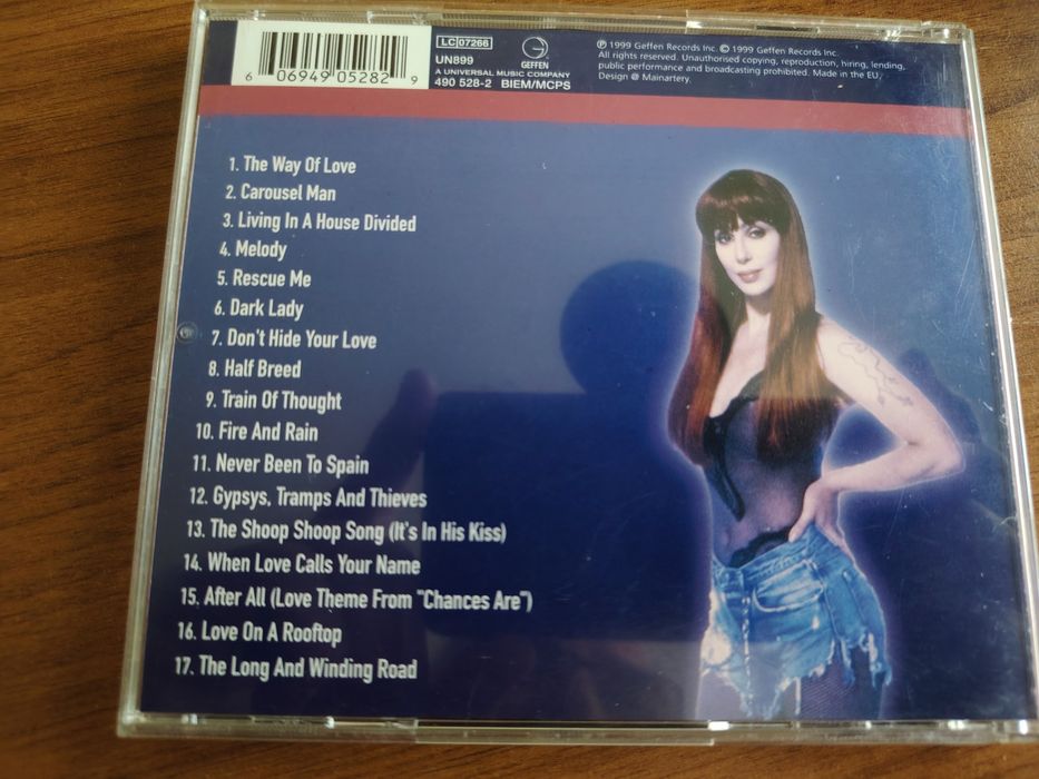 Три компакт диска на CHER