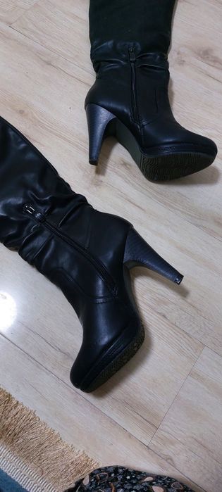 Новые женские сапоги