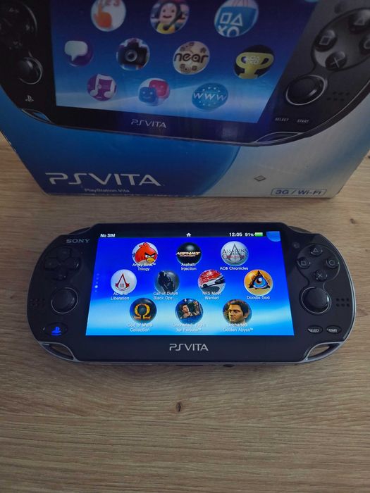 PS Vita Oled modat cu adaptor SD2Vita plus card Sandisk 64gb impecabil