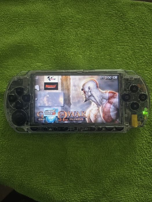 PSP 1000 modat 32 gb + încărcător