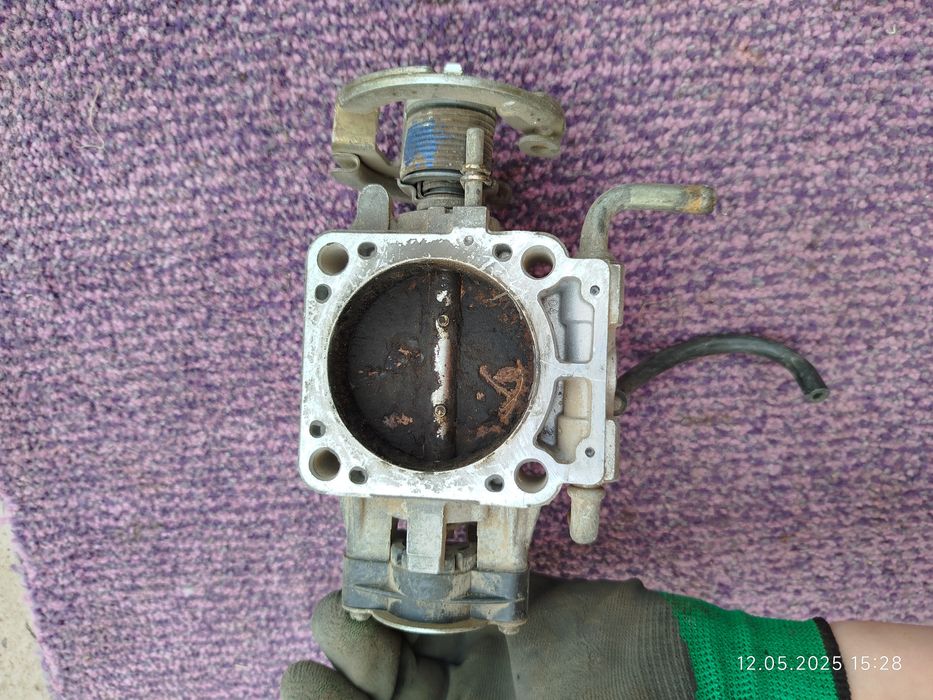 Дроссельная заслонка