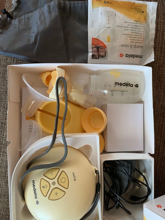 Молокосос medela swing