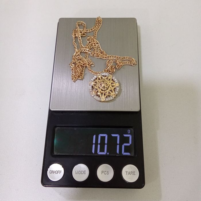 Золотая цепочка и кулон 585 проба , длинна  цепочки 56 см.