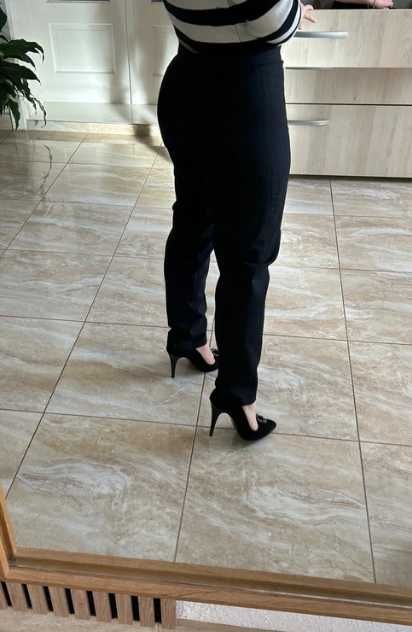 Pantaloni conici din stofa