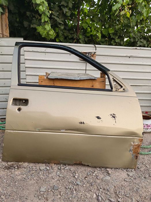 Двери нексия 2009