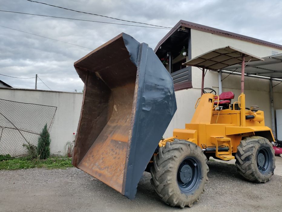 Buldoexcavator cu picon Dumper , Cilindru compactor