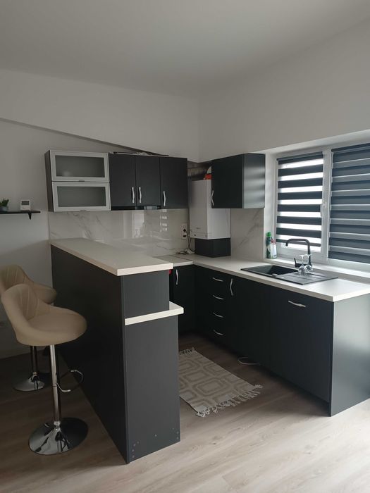 Studio de închiriat, bloc nou, parcare privată
