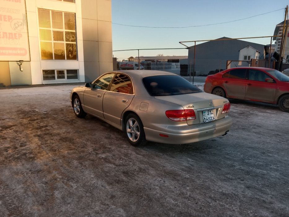 Мазда.  Милления