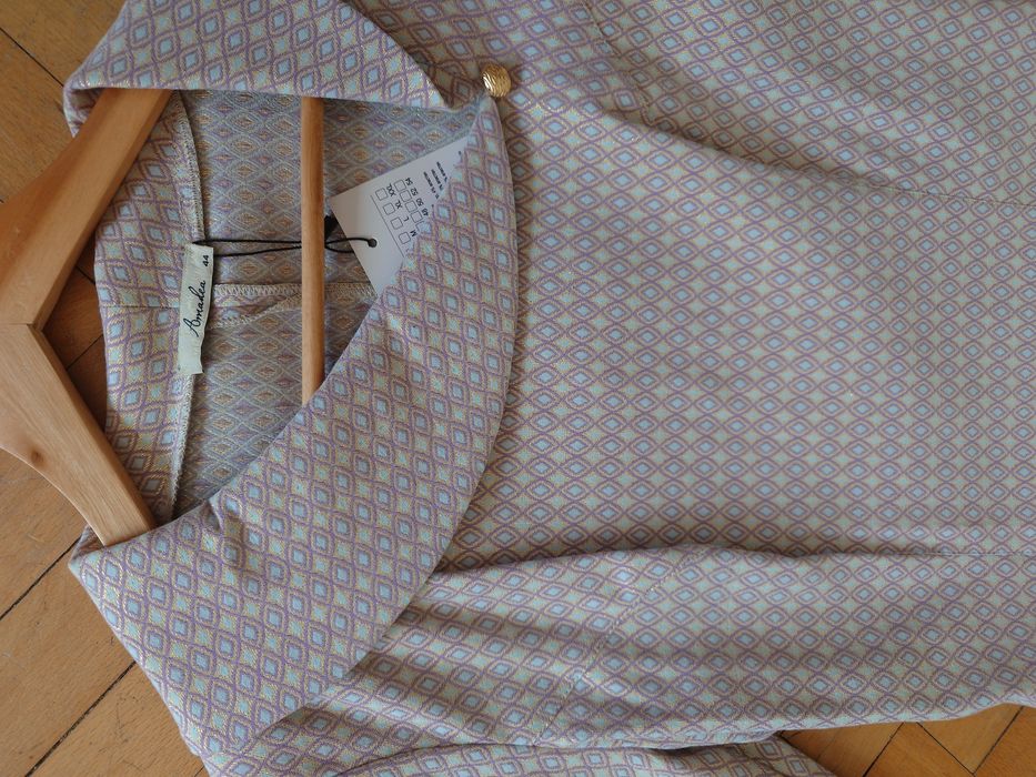 Нова елегантна рокля 38 размер златисто