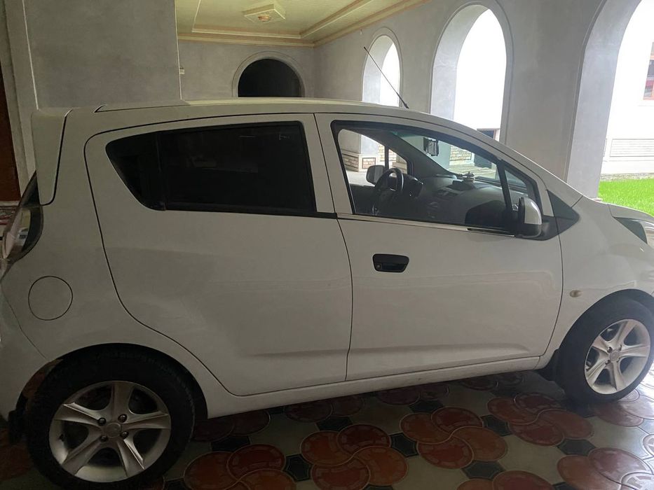 SPARK rangi oq 2011 yil holati zo'r