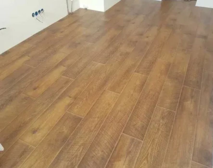 Настил ламината кварцвенила