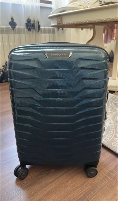 новый чемодан Samsonite