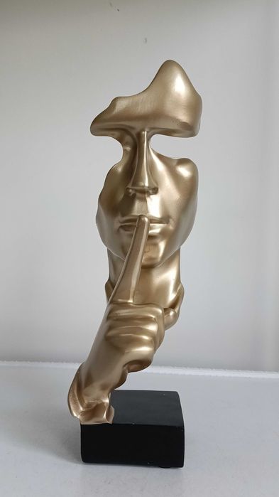" Мълчанието е злато " , абстрактна статуетка с размер 27 см.