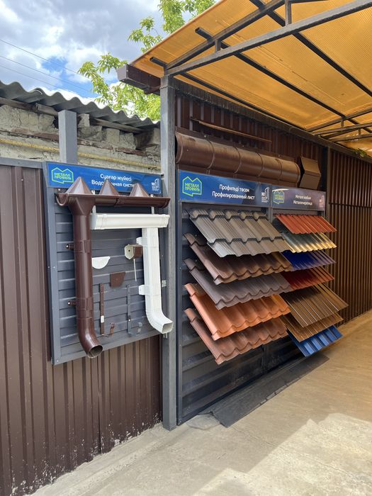 Металлочерепица, профлисты, водосток, карниз.