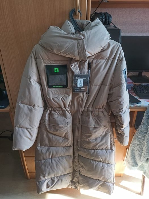 Продаю новый пуховик