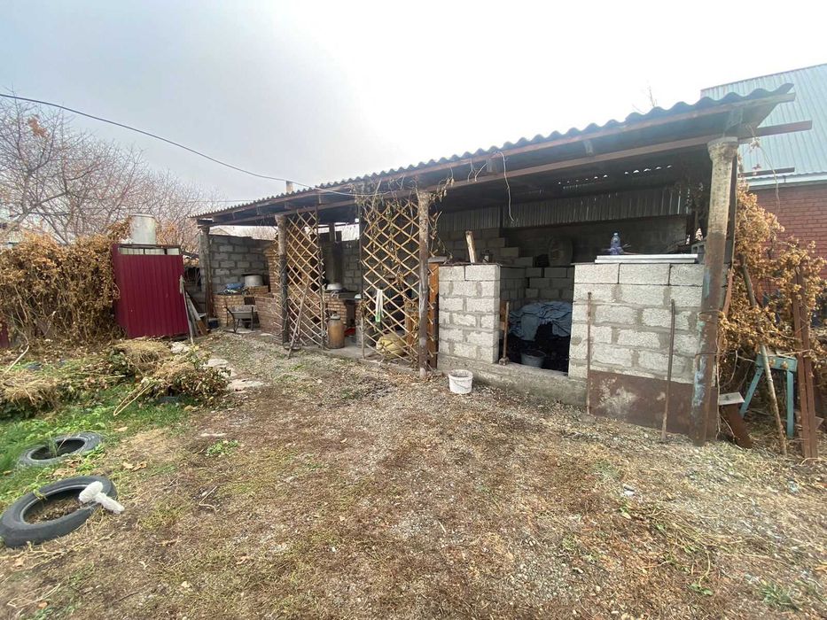 Дом, улица Калиева, Танат Империя