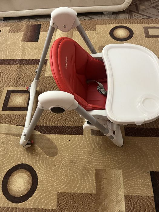 Продам коляску и стульчик для клрмления