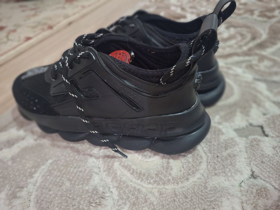 Versace chain reaction