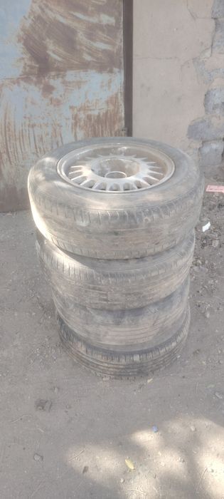 Комплект диск с шины на R 15.от БМВ Е 36