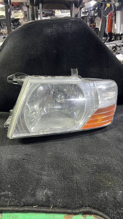 Передние фары Паджеро 3