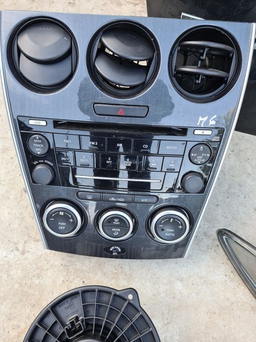 Radio cd,stopuri,ceasuri bord,climatronic Mazda 6 combi