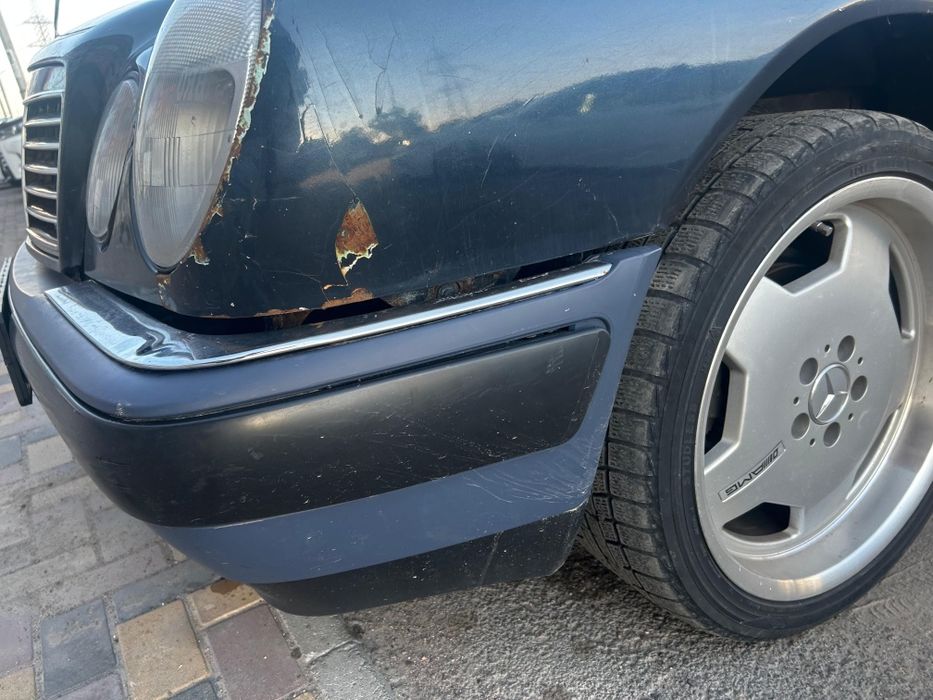 Передний бампер в сборе  Mercedes w210 до рест