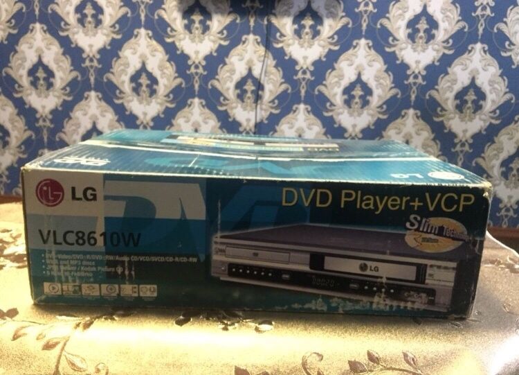 LG (2 в 1) DVD плеер + видеокассета
