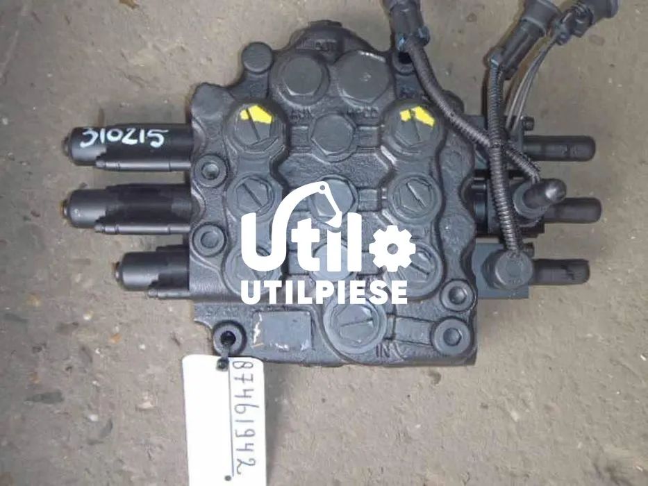 Distribuitor hidraulic New Holland LB95 LB110 LB115 TM135 + piese