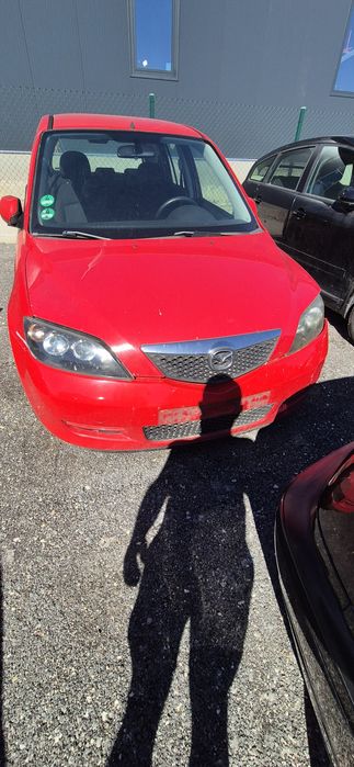 Мазда 2 1.6 на части