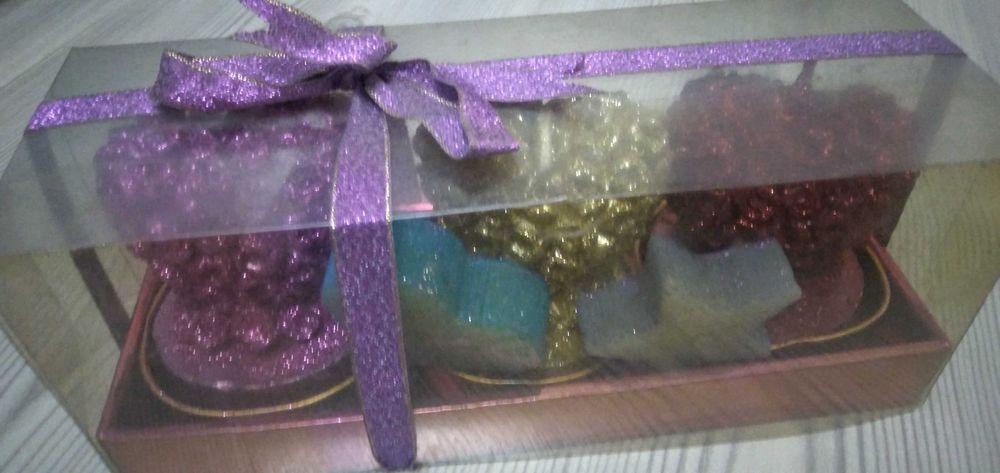 Свечи новые и 2 начатые