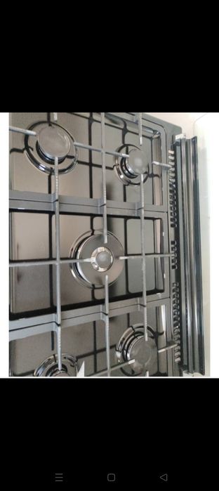 Новая газовая плита не пользовались цена 250.000 тг покупали за 300.00