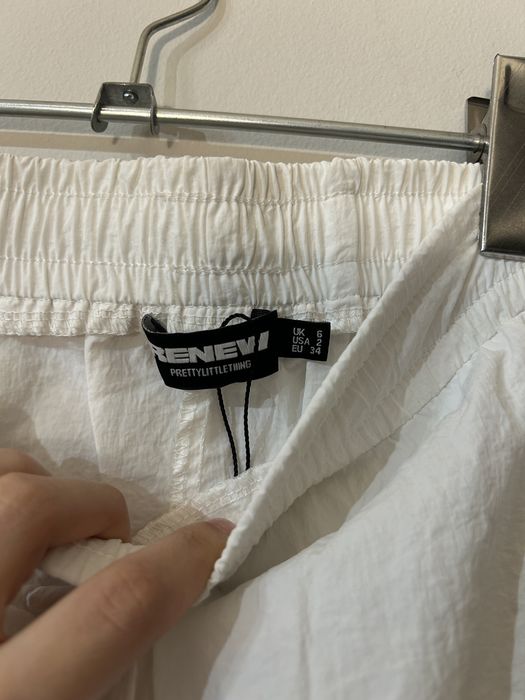 Pantaloni albi de fas