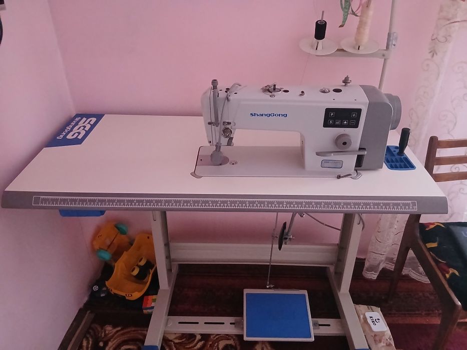 Tikuv mashinasi shangong holat yangi