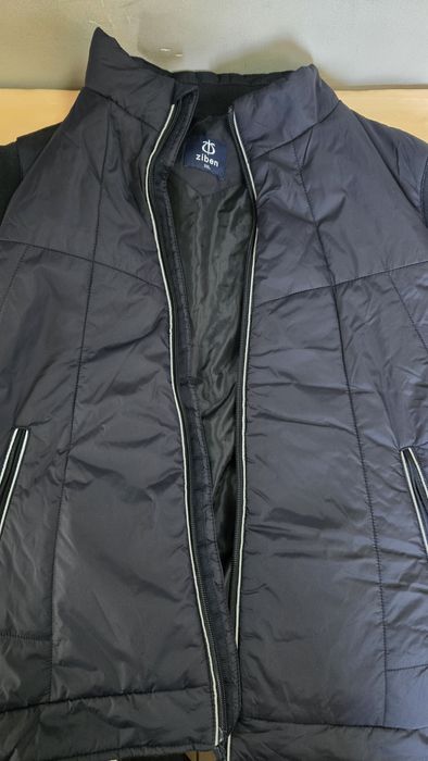 Продам фирменную жилетку