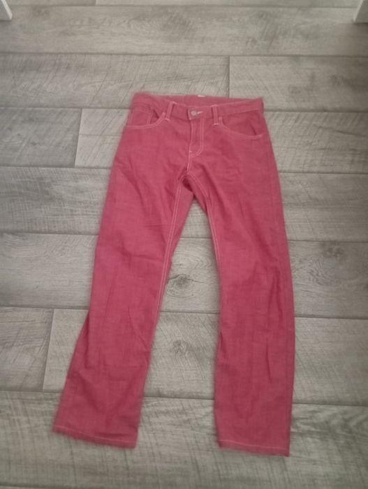 Продам джинсы красные