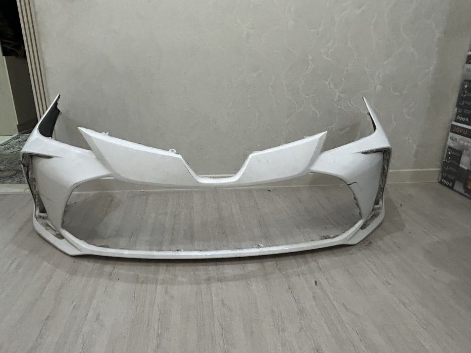 Бампер на toyota Corolla e210