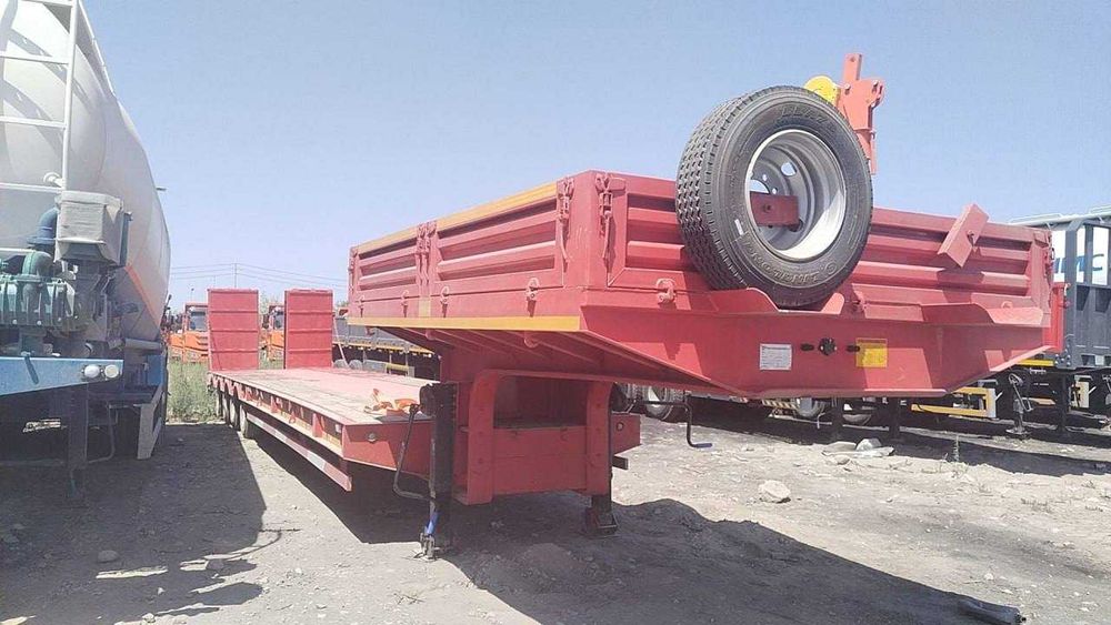 Полуприцеп тяжеловоз низкорамный Feilida-60т Tral podushka Orient Ozod