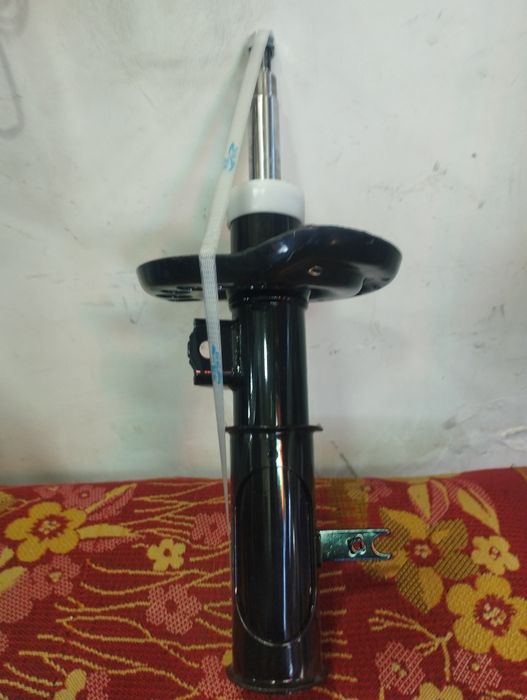 Малибу 2 амортизатор ,передний левый