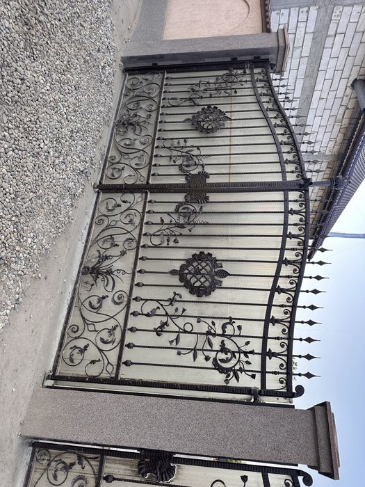 Porti fier forjat gard