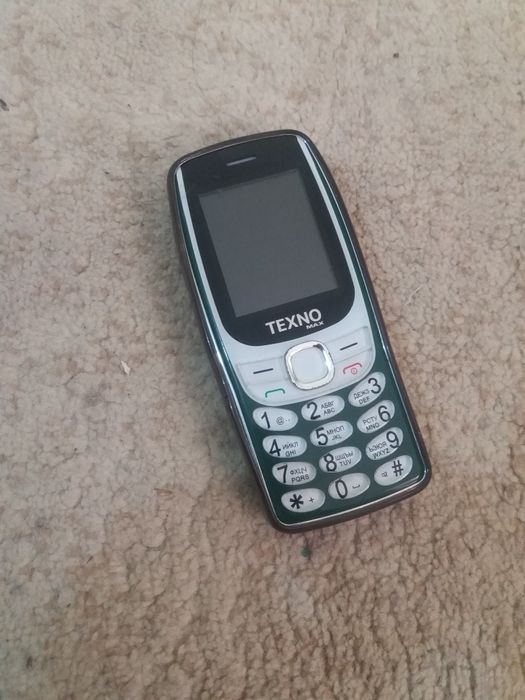 Texno max tugmali telefon