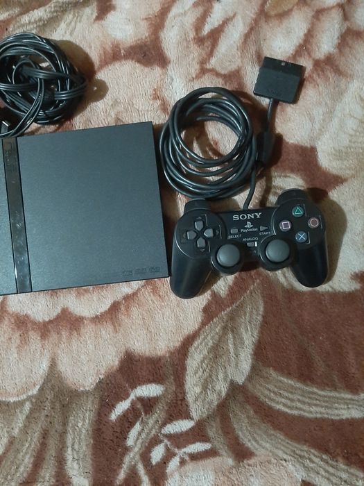 Vând PlayStation 2 slim complet în stare bună