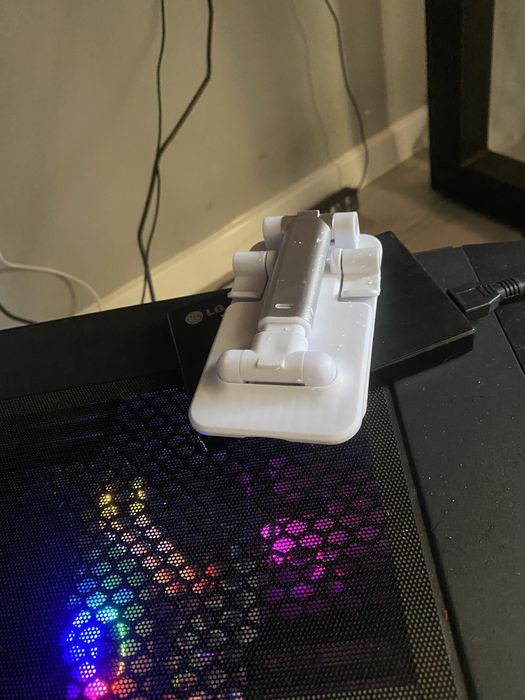 Подставка для телефона джостика.