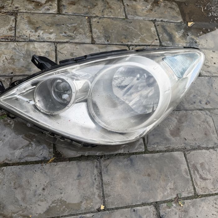 Фара левая Nissan Note