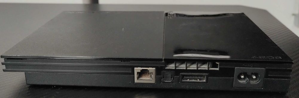 Playstation 2 model slim,modat, cu 33 jocuri de top ,maneta ,cabluri