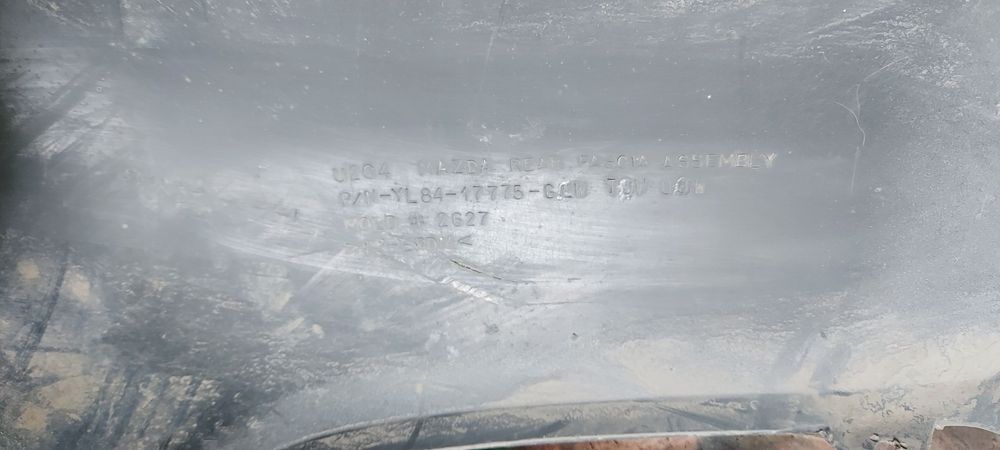 Задний бампер на мазду трибьют