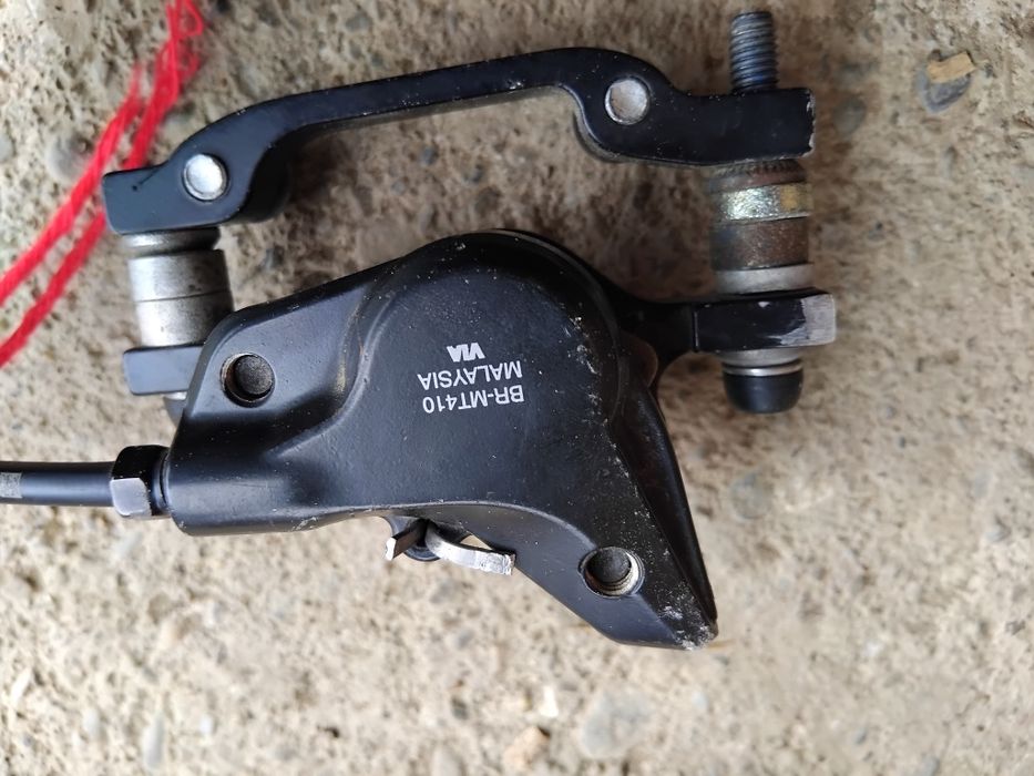 Vând set complet de frâne hidraulice Shimano (față + spate), utilizat.